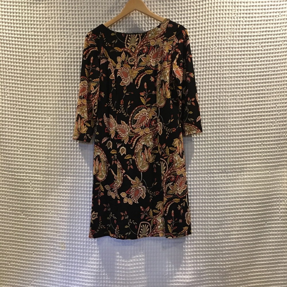 The Perfect Dress Floral dress w/ pleated hemline.